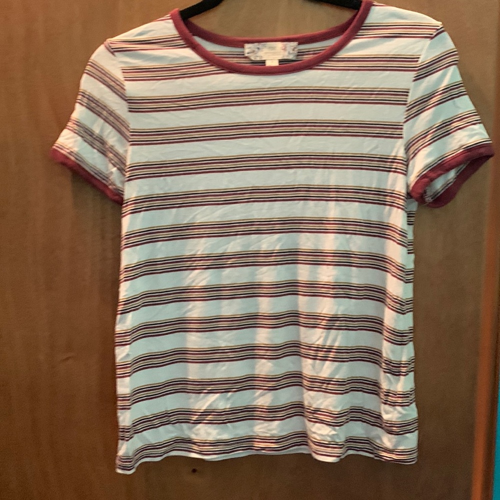 Cream color scoop neck top with burgundy gold and black strips